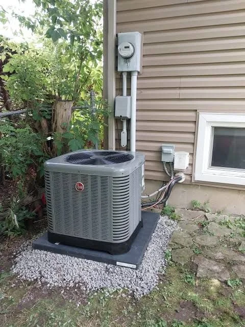 New air conditioning unit installed outside a residential home