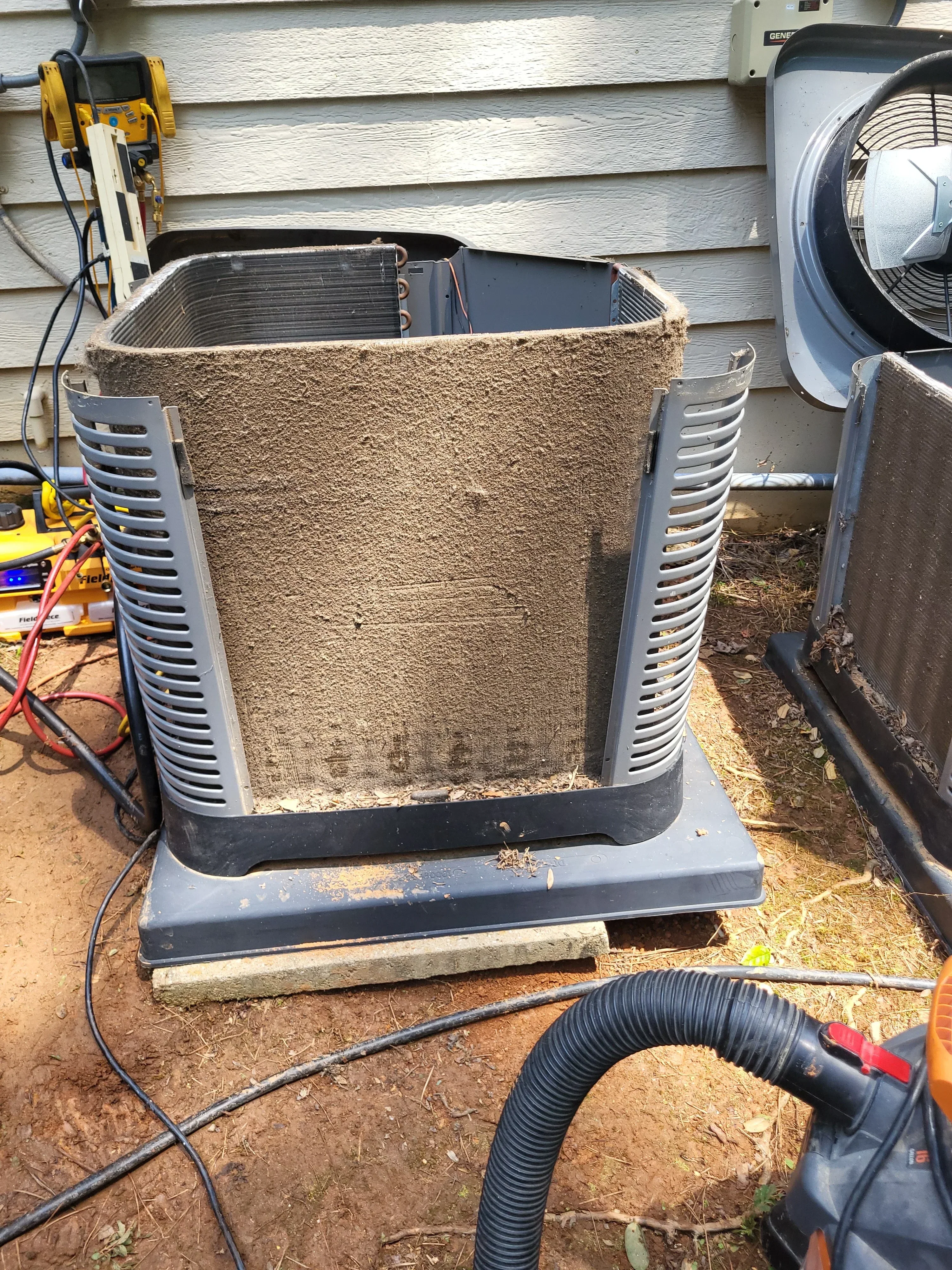 HVAC air handler unit with flexible ductwork and piping connections during installation